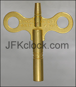 A brass, wing-style, double-ended Ingraham key