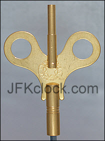 A brass, wing-style, double-ended New Haven  key